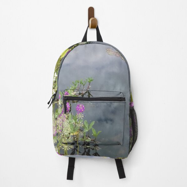 Item preview, Clouds reflected on the surface of a pond with flowering plants. designed and sold by claireseyeview.