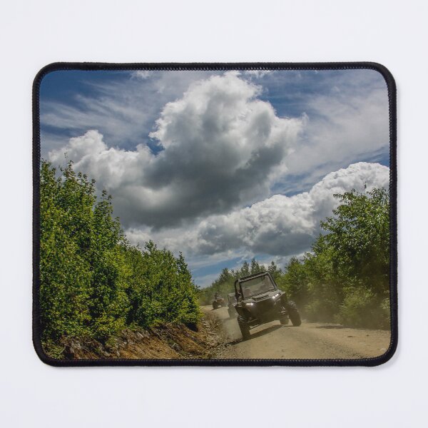 Item preview, Rider captured cruising the trails with wild clouds above it designed and sold by Katherine Rose.