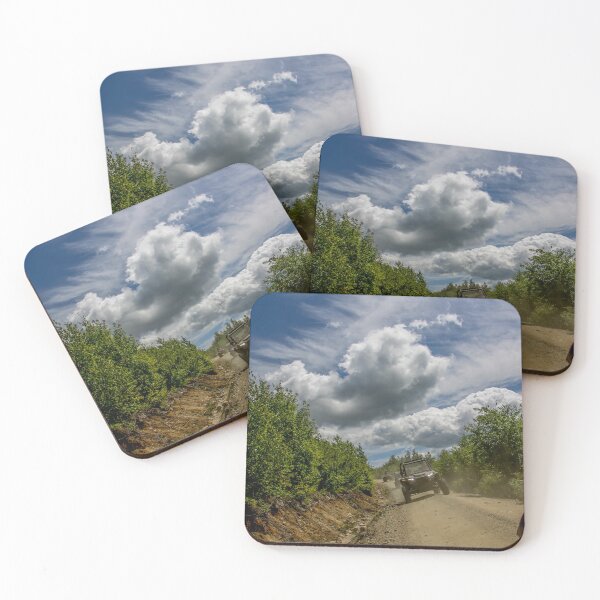 Item preview, Rider captured cruising the trails with wild clouds above it designed and sold by Katherine Rose.