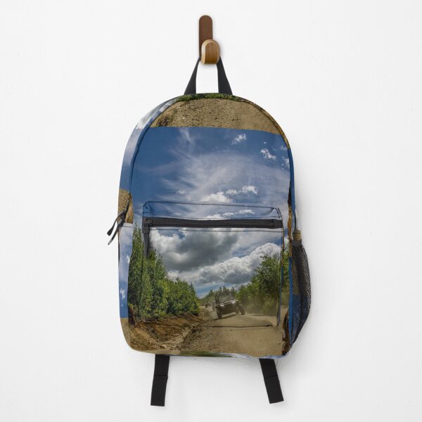 Item preview, Rider captured cruising the trails with wild clouds above it designed and sold by Katherine Rose.