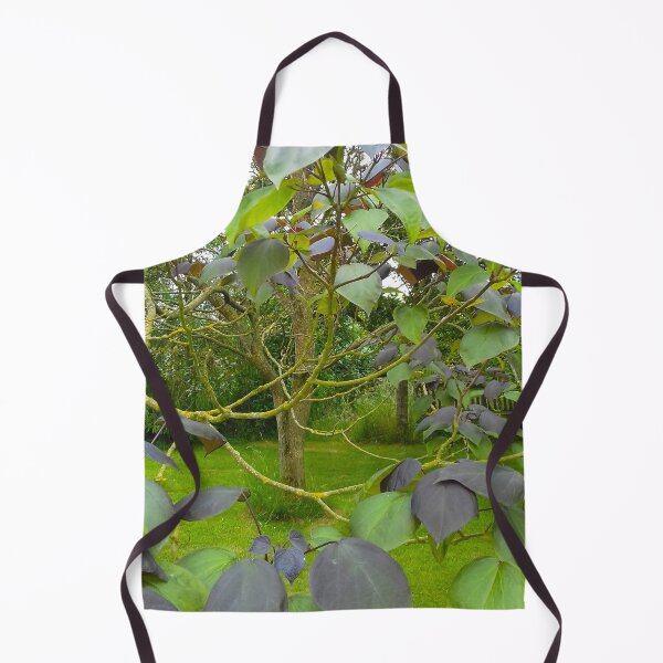 Item preview, Tree with large green and purple leaves on thin curving branches. designed and sold by claireseyeview.