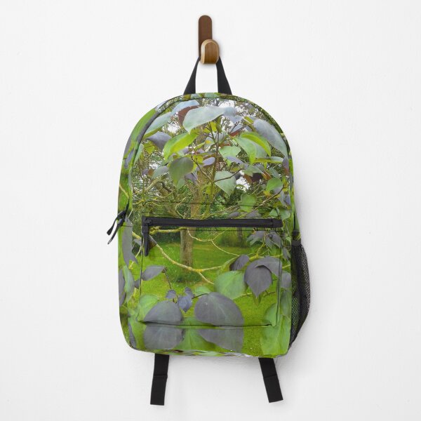 Item preview, Tree with large green and purple leaves on thin curving branches. designed and sold by claireseyeview.