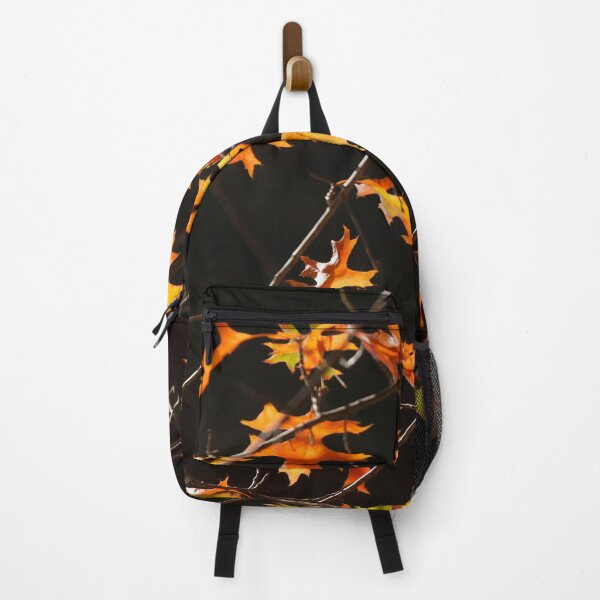Item preview, Maple (Acer palmatum), red autumn leaves on a tree, dark background designed and sold by Torsten Krüger.