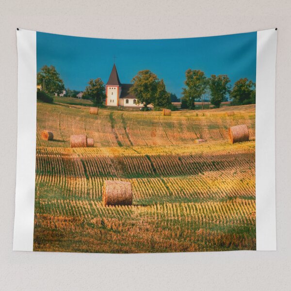 Item preview, Pressed straw on stubble, and a church in the background. designed and sold by HausmannArt.