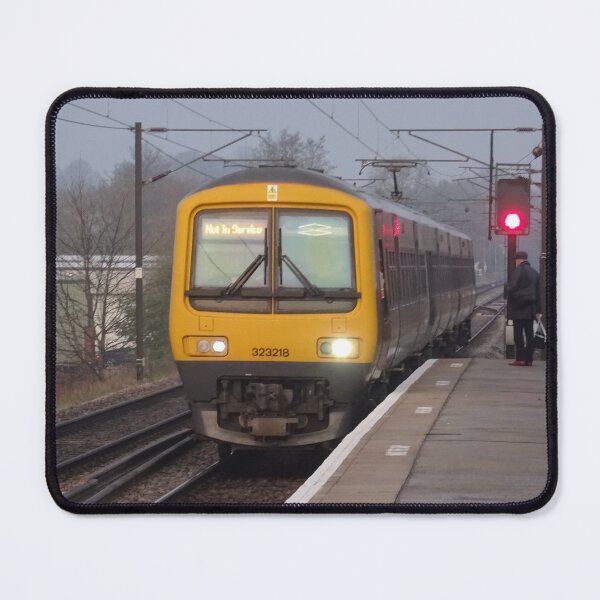 Item preview, West Midlands Trains 323218 at Lichfield Trent Valley designed and sold by Rorymacve.