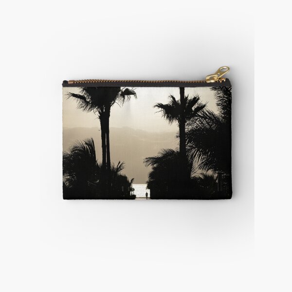 Item preview, Man on palm tree alley at Boa Vista beach designed and sold by raphotography88.