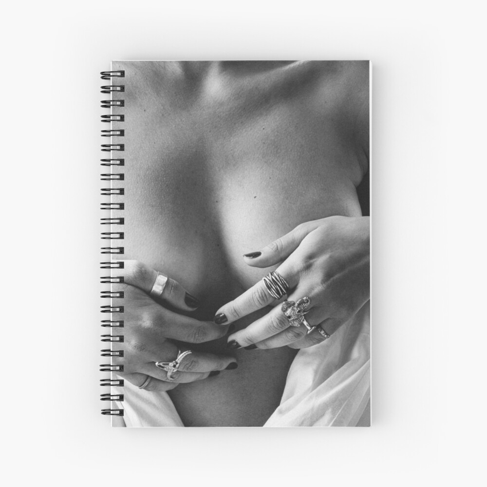 Black & white portrait of a nude topless woman/ girl, ornamented hands  covering her breast and hiding her nipples