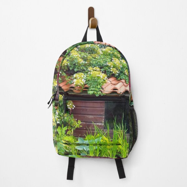 Item preview, Garden shed with terracotta roof tiles covered by climbing green plant. designed and sold by claireseyeview.