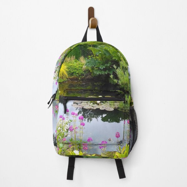 Item preview, Two white water lilies on a garden pond with plants around the edge. designed and sold by claireseyeview.