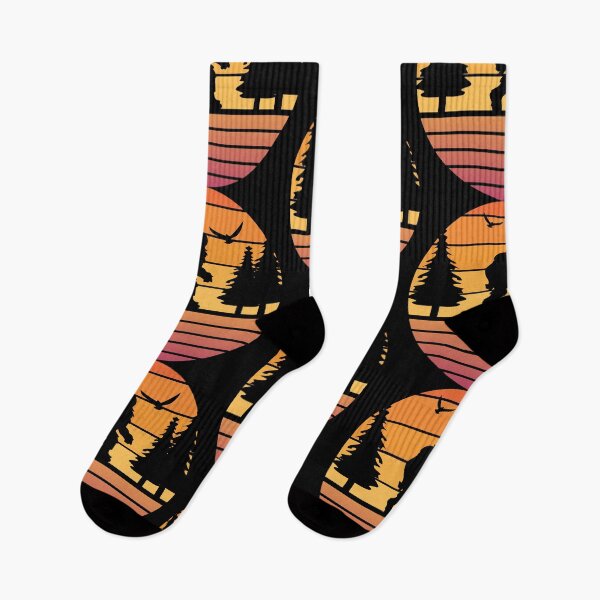 Item preview, Bigfoot Sasquasch sunset retro forest wilderness hiking camping designed and sold by MistyFigs.