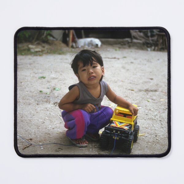 Item preview, Small Filippino boy playing alone. World kids designed and sold by JonDelorme.