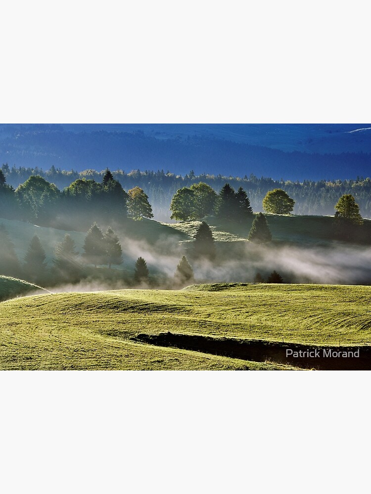 Mist and sun on Jura landscape by patmo