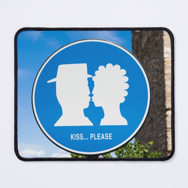 Item preview, Kiss street sign located in public area in front of Sirmione castle, Italy. Concept of love, couple, romantic designed and sold by Paolo Modena Photography - Fine Italian Art.