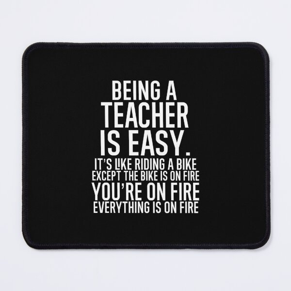 Item preview, Being A Teacher Is Easy It is Like Riding A Bike. Except the Bike is on Fire. You are On Fire. Everything is on Fire. designed and sold by TeesYouWant.
