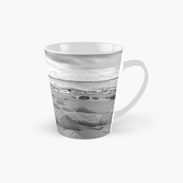Item preview, stone wall shelter on a beautiful beach in black and white designed and sold by morrbyte.