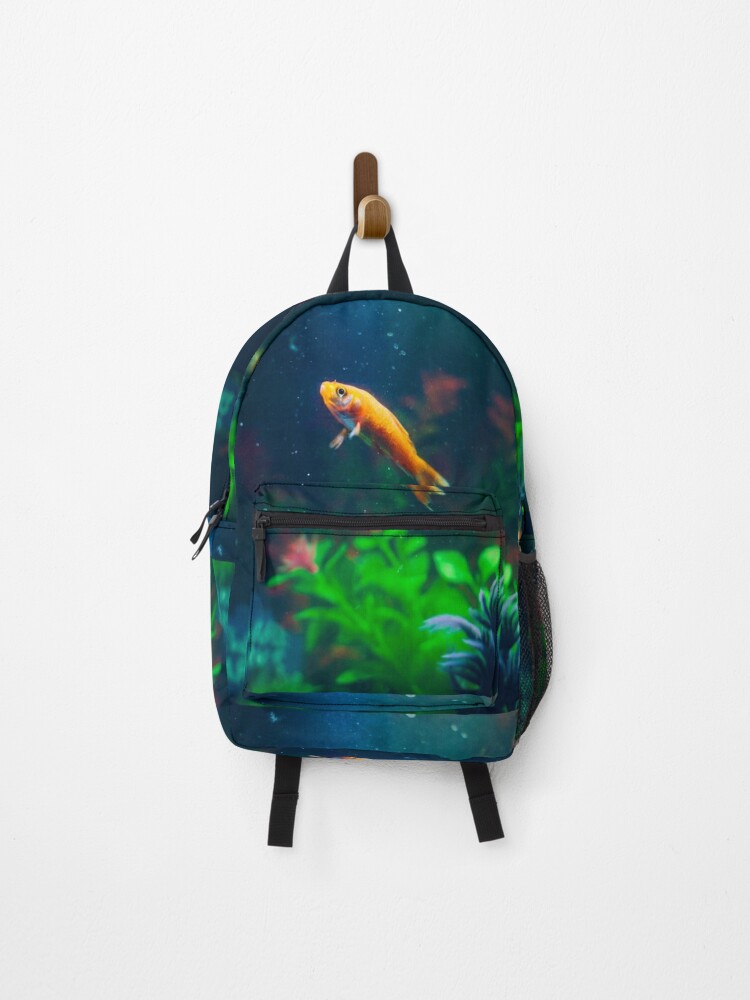 Gold fish swimming in aquarium with friends. | Backpack