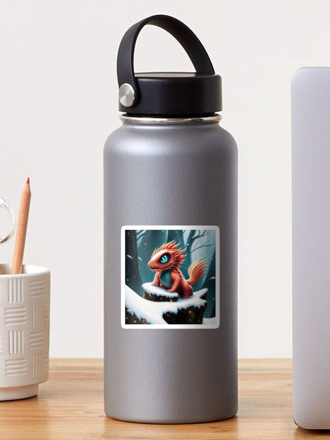 Thumbnail 1 of 3, Sticker, Baby Red Dragon on a Snowy Rock designed and sold by dragynrain.