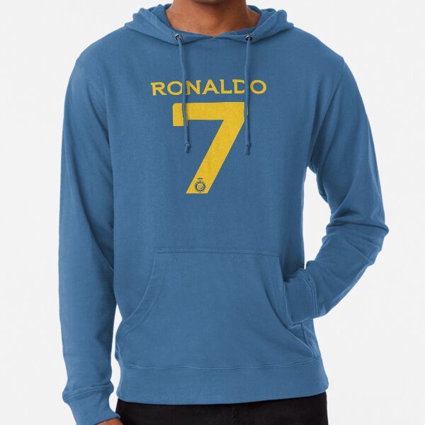 Vista previa del artículo con la obra «Ronaldo 7 Al-Nassr Football Club - نادي النصر السعودي», diseñado y vendido por Fan-Shop.