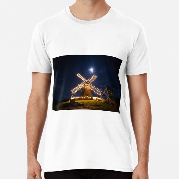 Item preview, Dutch Windmill and full moon with winter christmas lights in Netherlands, Holland at night designed and sold by aquinoxmedia.