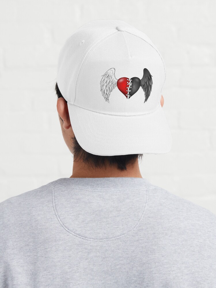 A half angel half demon heart Cap