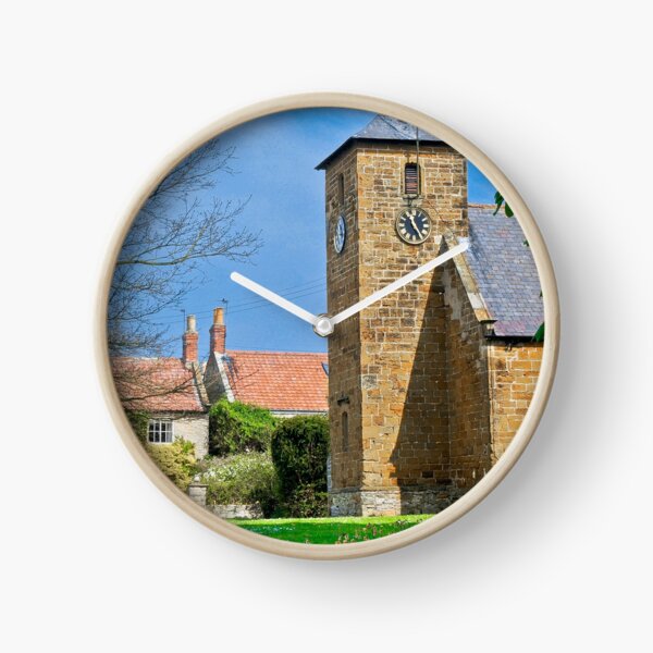 St. Mary’s church, on the village green. Clock
