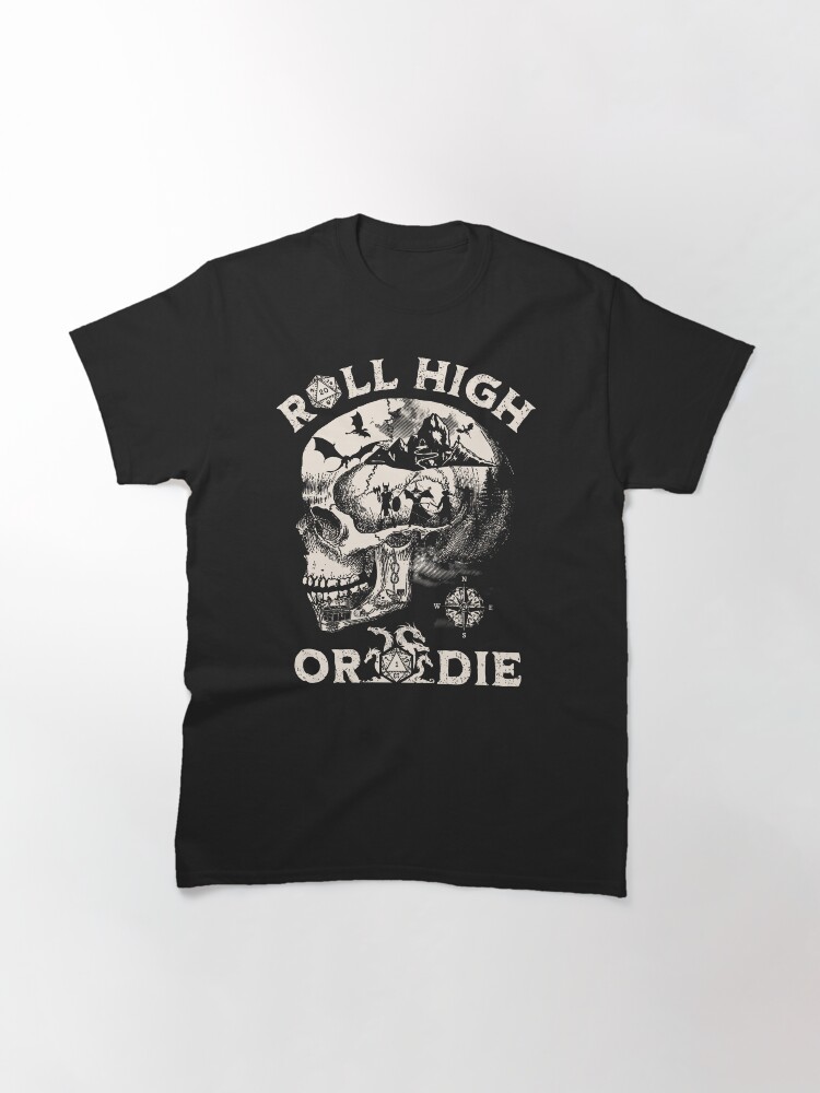 Thumbnail 3 of 7, Classic T-Shirt, Dungeons and Dragons: Roll High or Die. Party fighting dragons in a Skull Scene. designed and sold by DungeonAtelier.