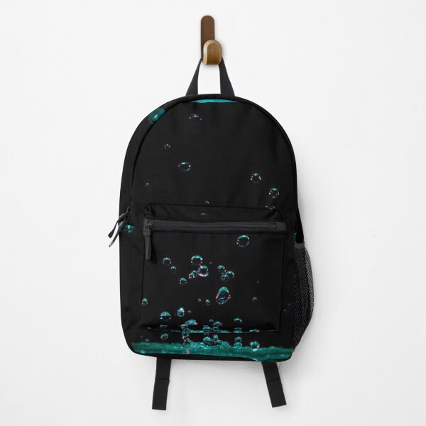 Item preview, Falling water droplets against a dark background. designed and sold by claireseyeview.