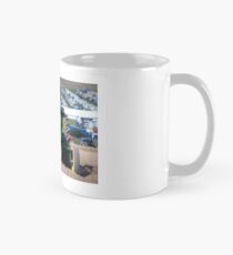 Ploughing the field Mug