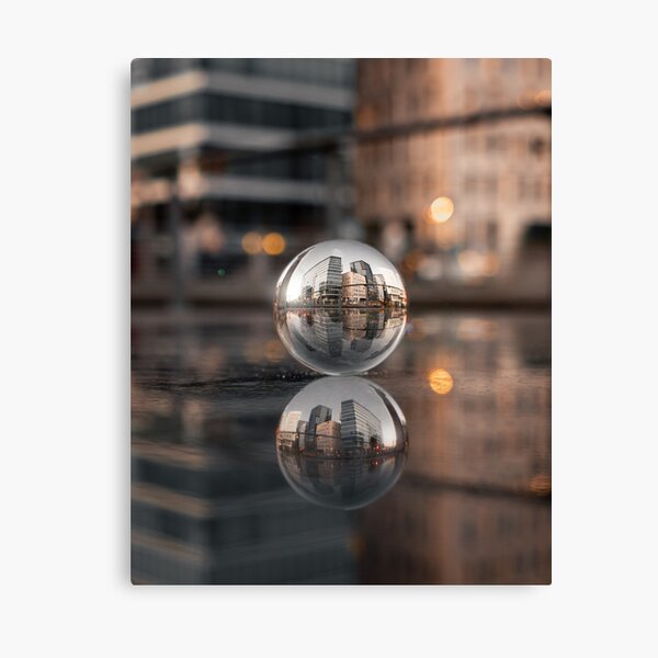Glass Ball and Skyscrapers Reflection Canvas Print