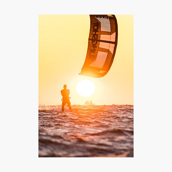 Item preview, Kitesurfer with kite in the sunset at the sea designed and sold by Jens Breuer.