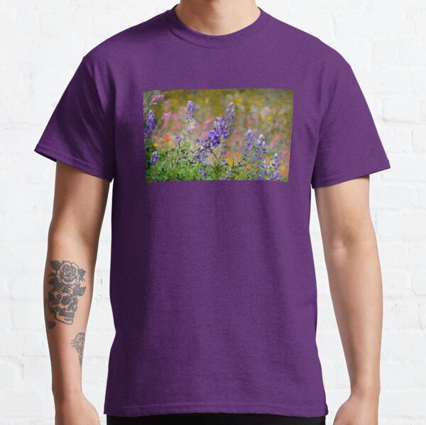 Wild flowers at sunset in Glacier National Park T-Shirt by Robert