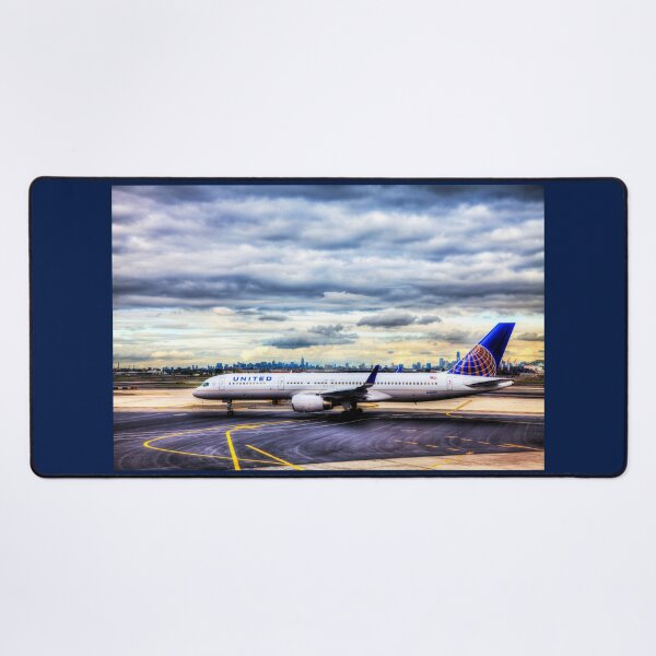 Item preview, United Airlines And Manhattan Skyline JFK Airport designed and sold by Paul Thompson Photography.