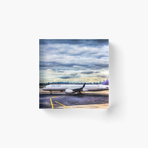Item preview, United Airlines And Manhattan Skyline JFK Airport designed and sold by Paul Thompson Photography.