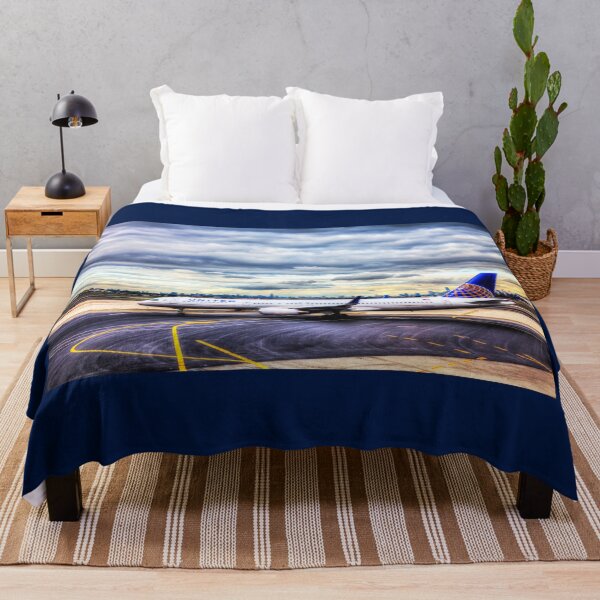 Item preview, United Airlines And Manhattan Skyline JFK Airport designed and sold by Paul Thompson Photography.