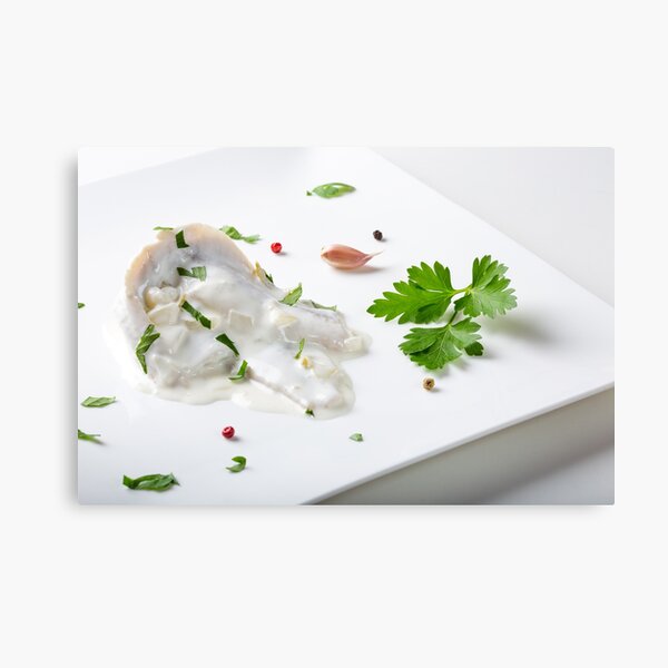 Marinated herring fish in mayonnaise sauce with herbs Canvas Print