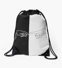Hands showing the creation of Adam Drawstring Bag