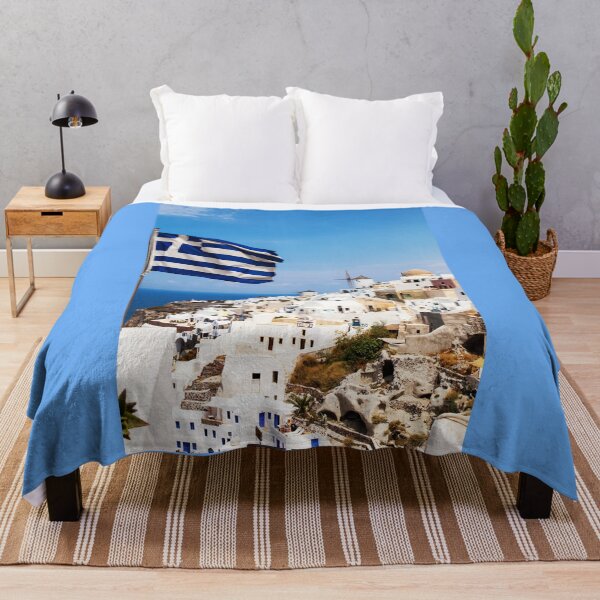 Item preview, Oia Village Santorini And Greek Flag designed and sold by Paul Thompson Photography.