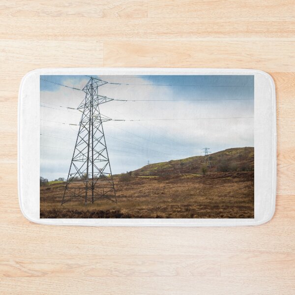 Item preview, Electricity pylons in a field on a cloudy day in winter at Kendoon Power Station, Galloway Hydro Electric Scheme, Scotland designed and sold by SnapTPhotograph.