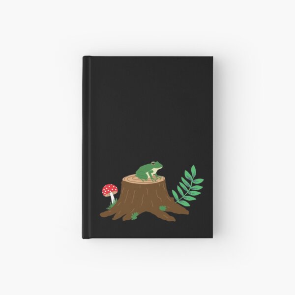 Frog on a tree stump with a mushroom Hardcover Journal