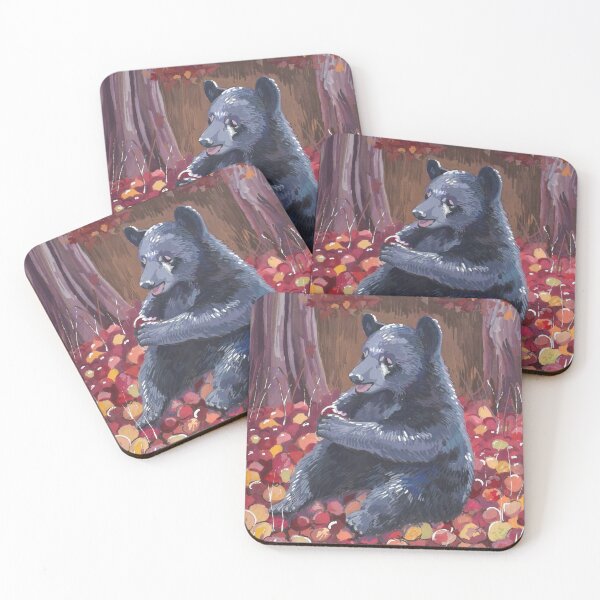 Item preview, Happy Black Bear eating an apple on a pile of apples in the woods designed and sold by Nick Garnhart.