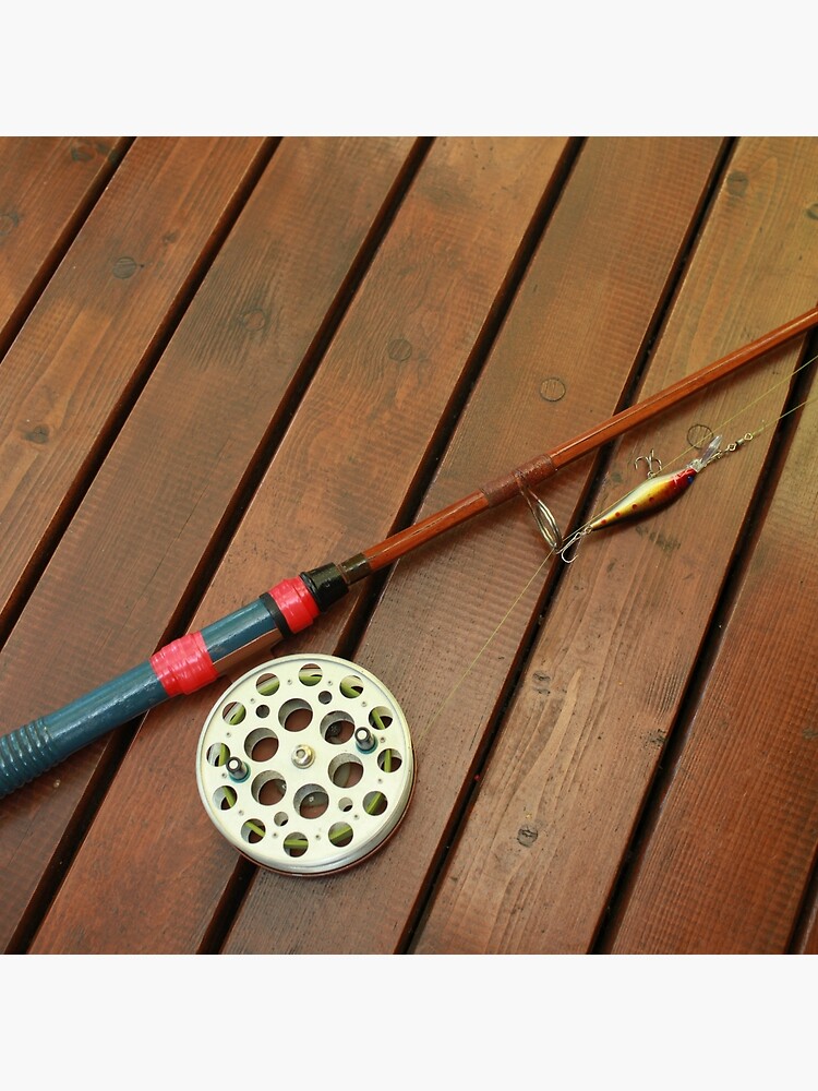 Vintage Fishing Rod With A Big Reel And A Wobbler Stock Photo - Download  Image Now - Backgrounds, Color Image, Equipment - iStock