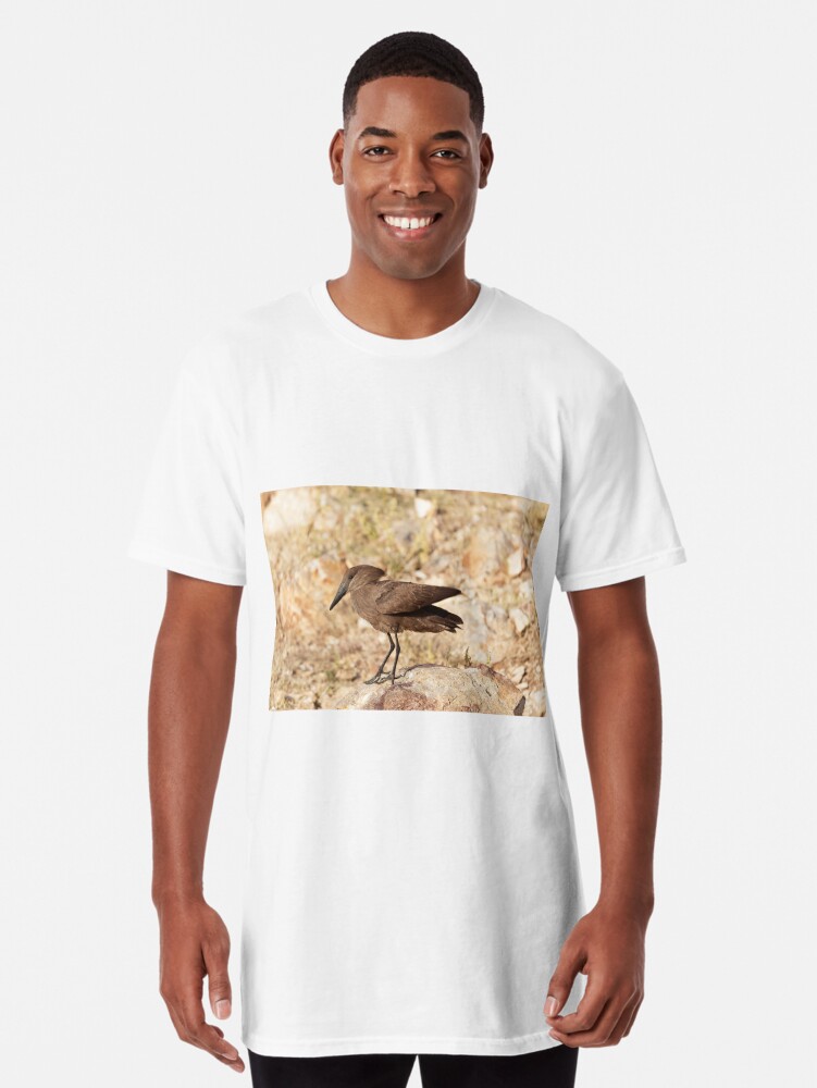 Hamerkop (Scopus umbretta) on a rock in East Africa. Long T-Shirt for Sale  by Zosimus