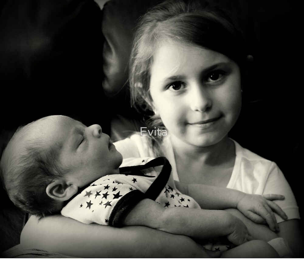 "Little Girl Holding Baby" by Evita Redbubble