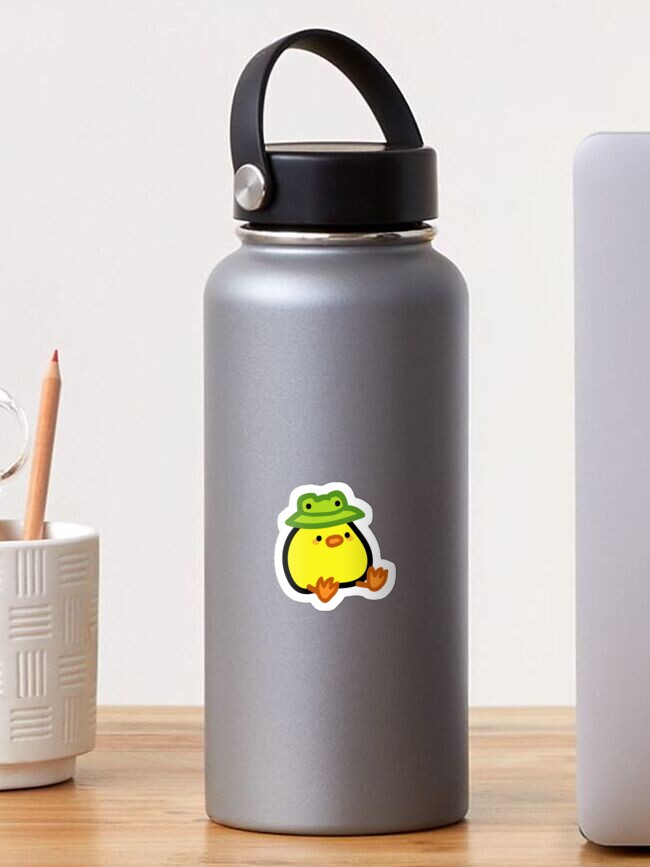Aperçu 1 sur 3. Sticker avec l'œuvre canard au chapeau de grenouille créée et vendue par TeaBag114.