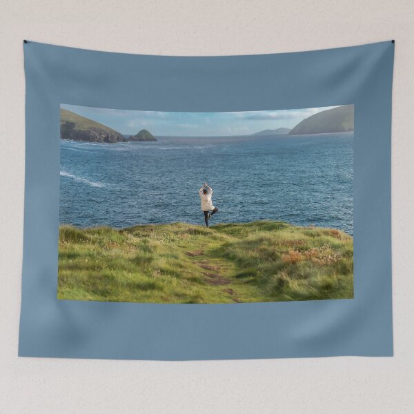 Item preview, Woman doing yoga on the shore of Atlantic Ocean, this is the Dingle Peninsula on Ireland’s Wild Atlantic Way, southwest Atlantic coast designed and sold by AlbertMi.