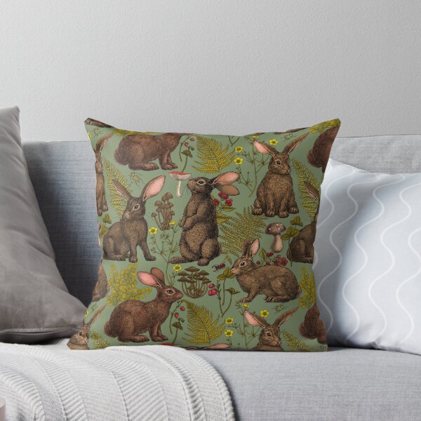 Rabbits and woodland flora Throw Pillow