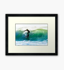Surfing the waves Framed Print
