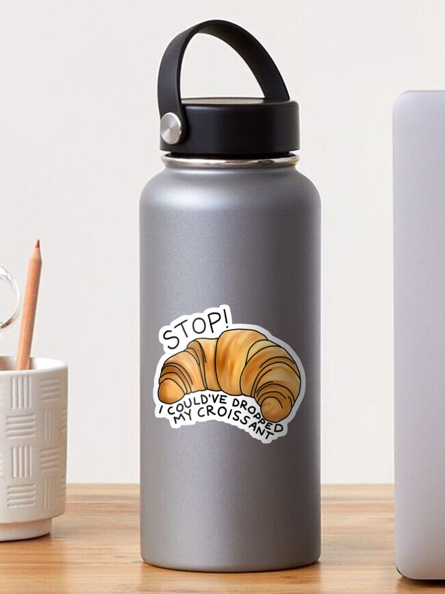 Imagen 1 de 3, Pegatina con la obra ¡Podría haber dejado caer mi croissant!, diseñada y vendida por tommycoasts.