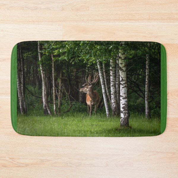 Item preview, A majestic red deer grazing in a meadow in summer designed and sold by AlbertMi.