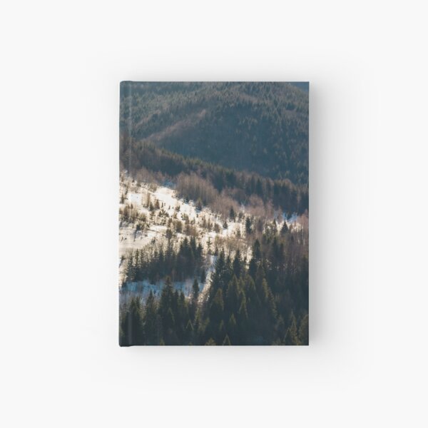 snow covered meadow among forest on hillside Hardcover Journal